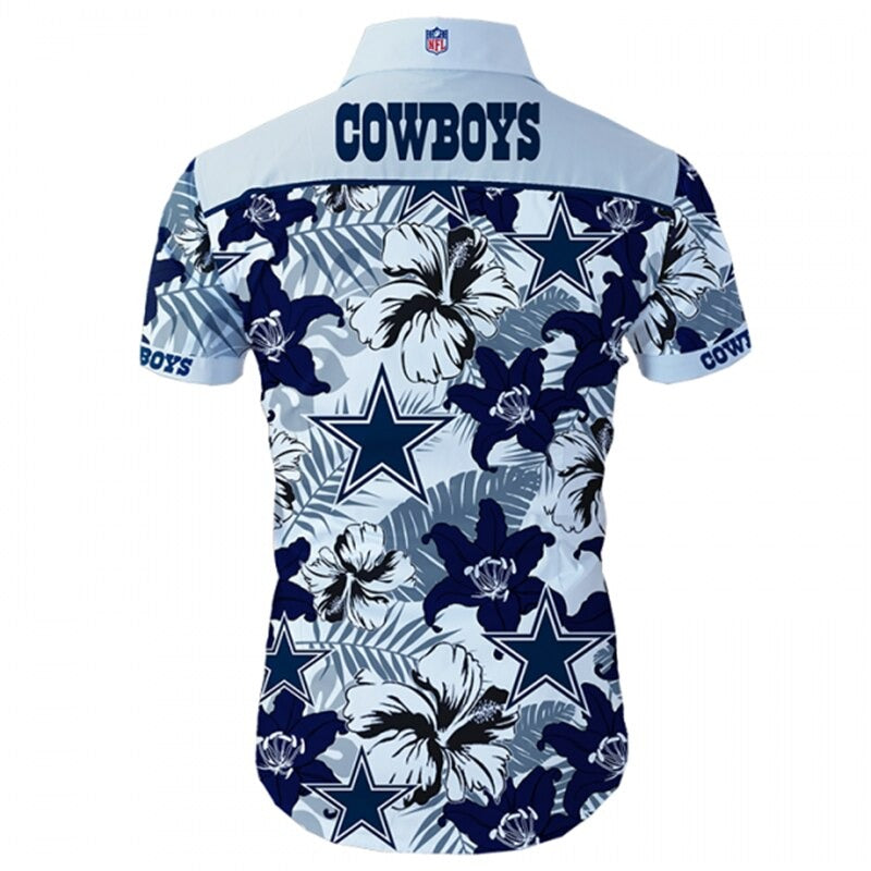 Back view of Dallas Cowboys Hawaiian Shirt featuring bold team name and logo, tropical hibiscus floral pattern, WHITE shoulder panel, men's short-sleeve button-down.