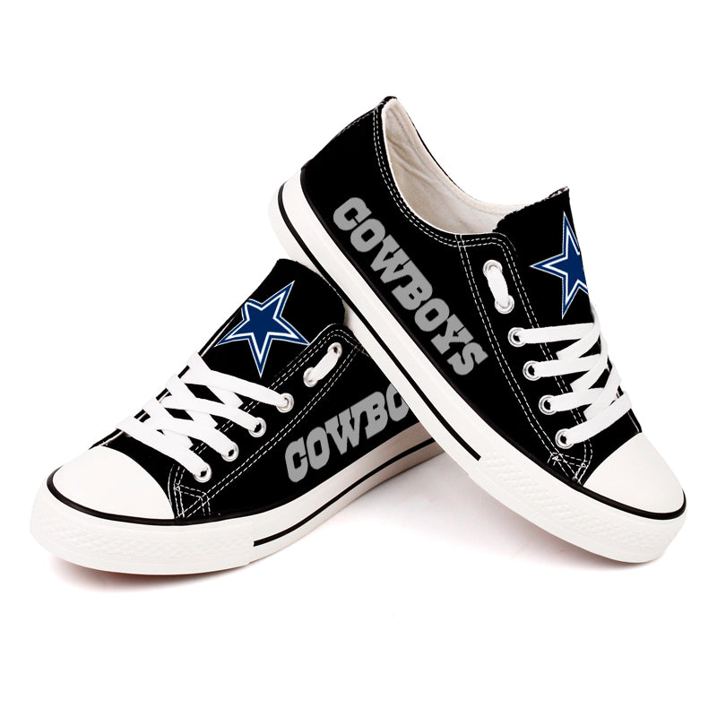 Angled view of the Dallas Cowboys Low-Top Canvas Fan Shoes, emphasizing the clean black and white colorway and the team spirit design