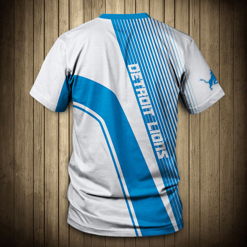 Back view of Men’s Detroit Lions T-Shirt – Striped Graphic Look with vertical stripes, large Detroit LIONS text print, and dynamic color block design in WHITE and blue."