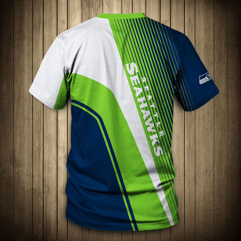 Back view of Men’s Seattle Seahawks T-Shirt – Striped Graphic Look with vertical stripes, large Seahawks text print, and dynamic color block design in BLUE, BLACK and GREEN."