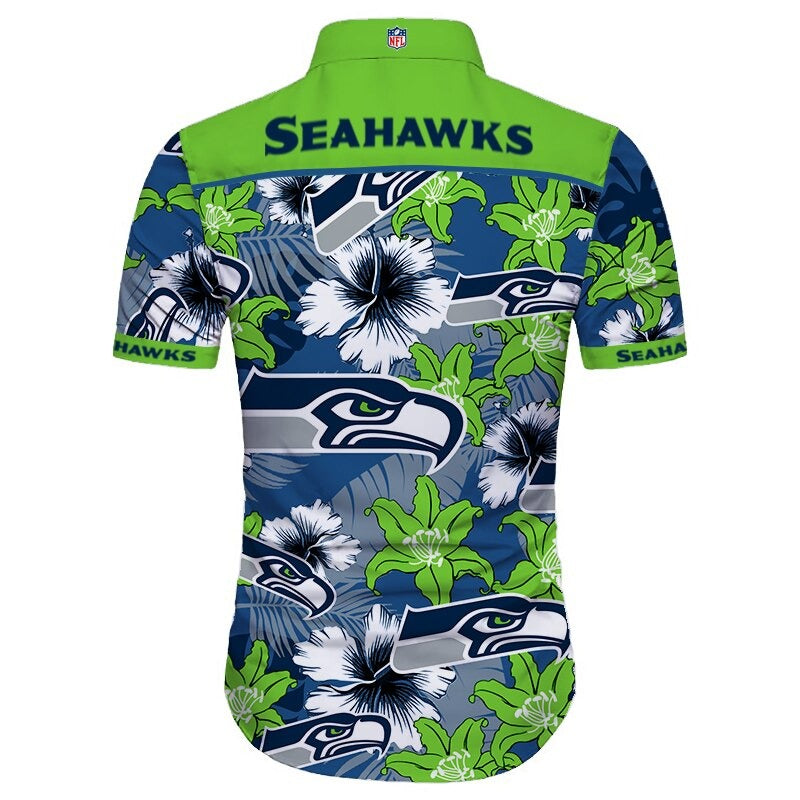 Back view of Seattle Seahawks Hawaiian Shirt featuring bold team name and logo, tropical hibiscus floral pattern, GREEN shoulder panel, men's short-sleeve button-down.