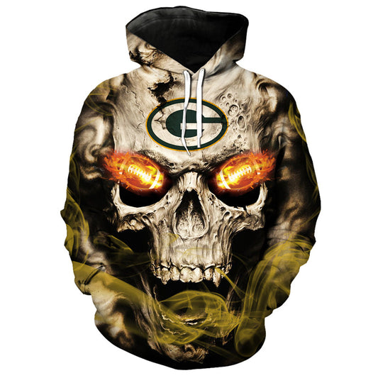 Front view of Green Bay Packers Skull Hoodie – Red Inferno Edition, featuring a gothic skull design with glowing red football eyes and a Green Bay Packers on the forehead.