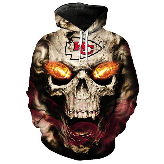 Front view of Kansas City Chiefs Skull Hoodie – Red Inferno Edition, featuring a gothic skull design with glowing red football eyes and a Kansas City Chiefs on the forehead.