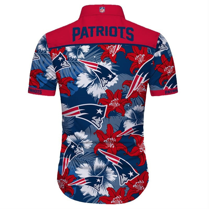 Back view of  New England Patriots Hawaiian Shirt featuring bold team name and logo, tropical hibiscus floral pattern,  RED shoulder panel, men's short-sleeve button-down.